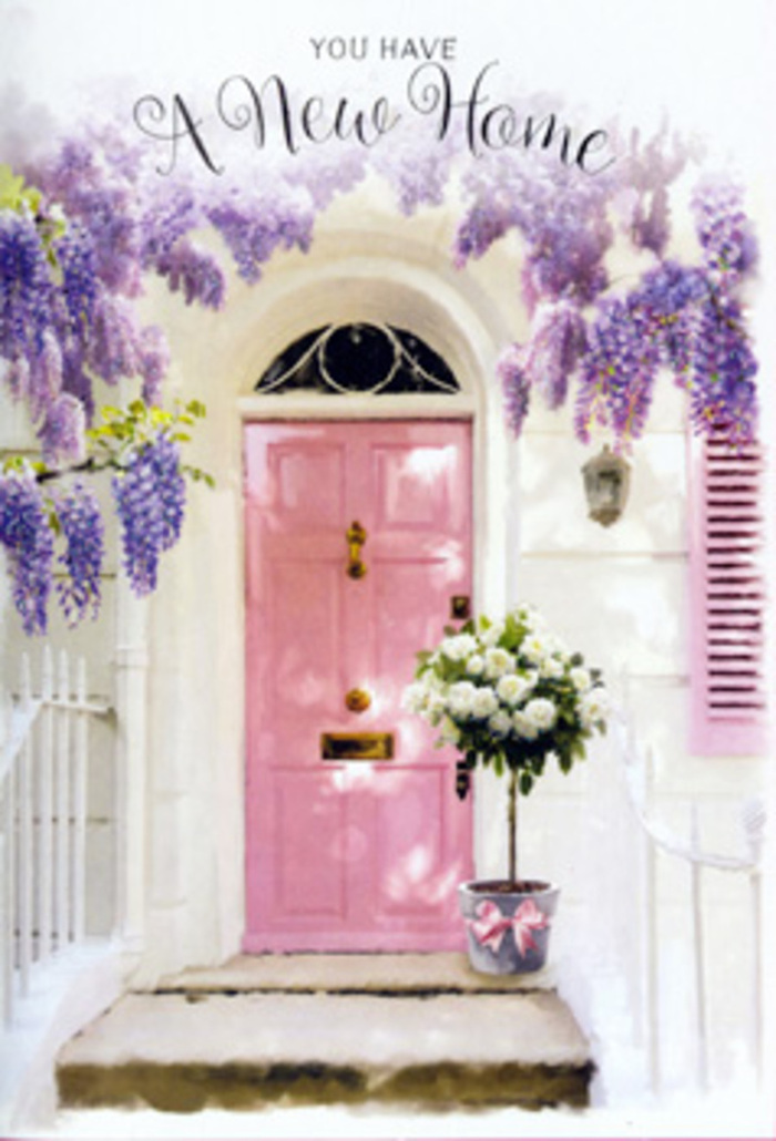 In this image, an inviting South Wimbledon doorway becomes a gentle still life of pastel colour and scent, almost as if a local florist has just stepped back to admire their work. The front door, painted in a soft yet confident shade of pink, stands tall at the centre. Its clean lines and lightly satin finish reflect a wash of natural light, giving the surface a subtle sheen that contrasts with the more rustic texture of the surrounding walls. Those walls are whitewashed with a slightly uneven, almost plaster-like effect, suggesting the age and character of a home that has seen families come and go along nearby Wimbledon Broadway. Off to one side, a narrow shutter echoes the door's blush tone, its slats closed and edged with gentle weathering, adding to the sense of lived-in charm. Draped above and around the top of the doorway, wisteria vines spill down in abundant cascades. Their blossoms form pendulous clusters in shades of lavender and pale purple, overlapping in layers so that the eye reads them as a flowing curtain rather than individual stems. The wisteria casts delicate shadows across the door and wall, and you can almost imagine the soft rustle of its leaves when a breeze slides up from South Park Gardens. Nestled at the foot of the door on the front step is a cylindrical metal bucket in a quiet, cool grey. It is filled to the brim with creamy white roses, their petals densely layered and velvety. Some blooms lean outwards, as though reaching into the open air, while others remain upright, building a rounded, generous silhouette. Pockets of soft green foliage sit between the roses, giving depth and a hint of woodland freshness. Tied neatly around the bucket's base is a satin ribbon in rose-pink, its ends falling in relaxed curves that echo the downward sweep of the wisteria above. The entire arrangement speaks of new beginnings and thoughtful gestures, the kind of doorstep flowers a close friend might send in South Wimbledon to say, I'm so happy you've found your new place, and to fill that first crossing of the threshold with beauty and comfort.